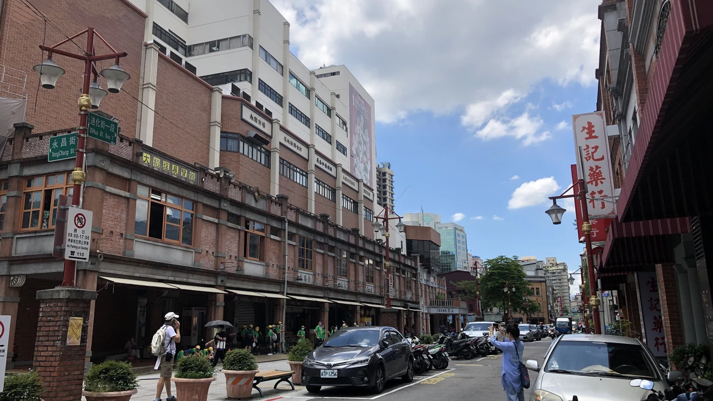 Shops and pedestrians along Dihua Street in Taipei