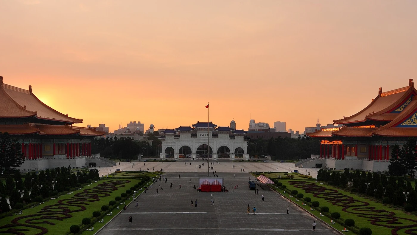 Liberty Square and its ceremonial gate glowing at sunset in Taipei
